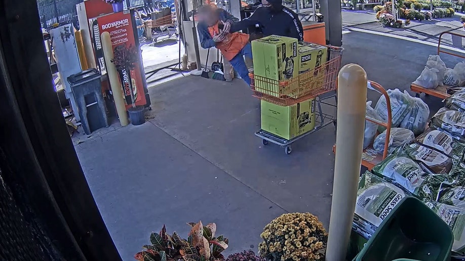 suspect shoving Home Depot worker