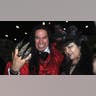 Man and woman in vampire Halloween costumes