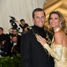 Tom and Gisele smiling