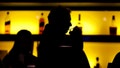 FILE - In this Nov. 30, 2017 photo, a patron sips his drink while having a meal at a bar in New Jersey. More government data points to alcohol's increasing role in U.S deaths, including a new report that found that the alcohol-induced death rate rose nearly 30% during the first year of the COVID-19 pandemic.