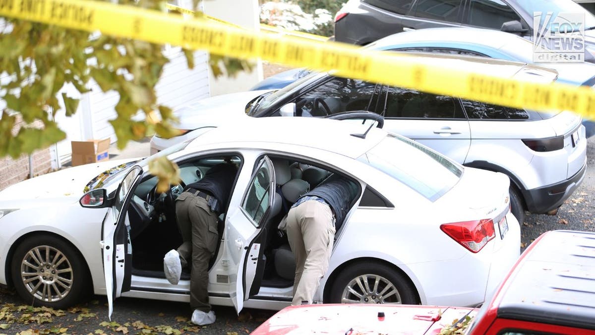 Idaho investigators at the scene of a quadruple homicide
