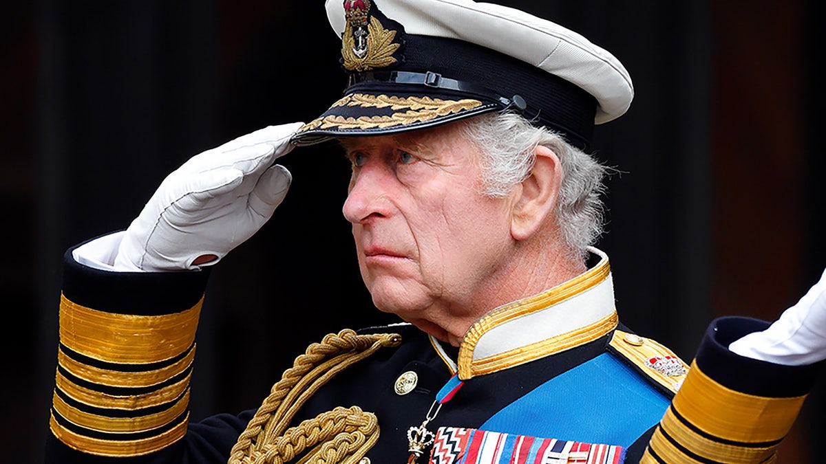 King Charles saluting