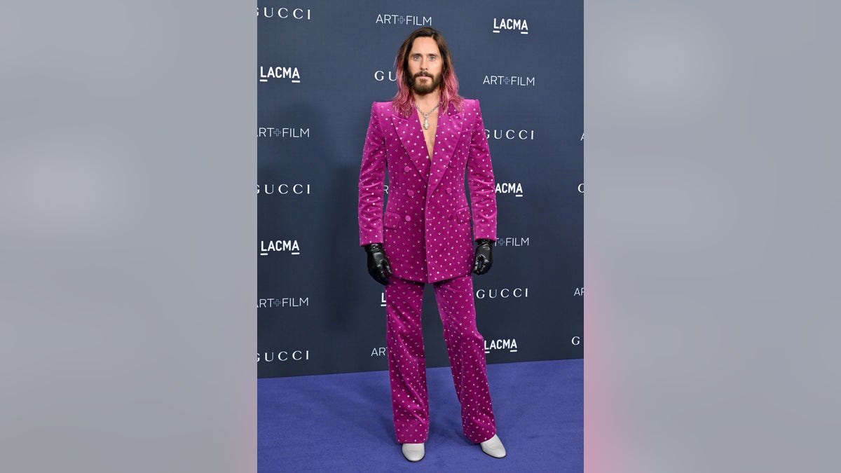 Jared Leto wore a pink sparkly suit that matched his pink hair