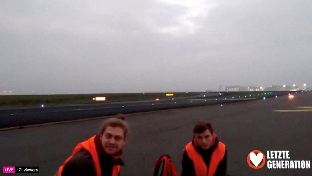 Climate change activism group Last Generation protest on runway