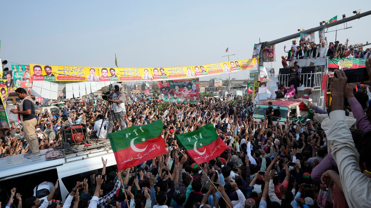 Supporters of Khan march