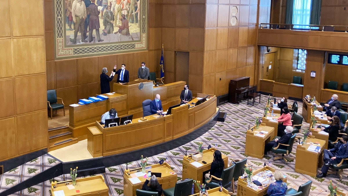 New House Speaker Dan Rayfield being sworn in