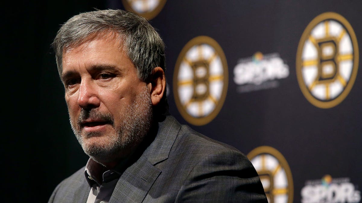 Cam Neely addresses the media during a press conference