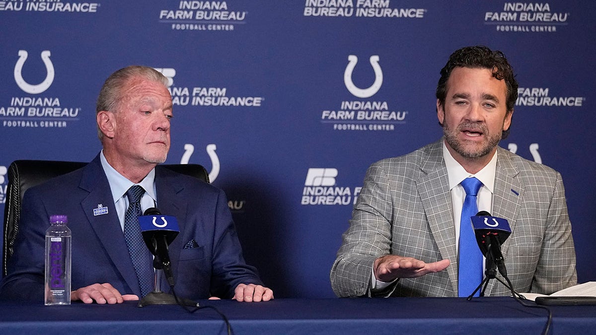 Indianapolis Colts punter Pat McAfee (1) talks to Jeff Saturday