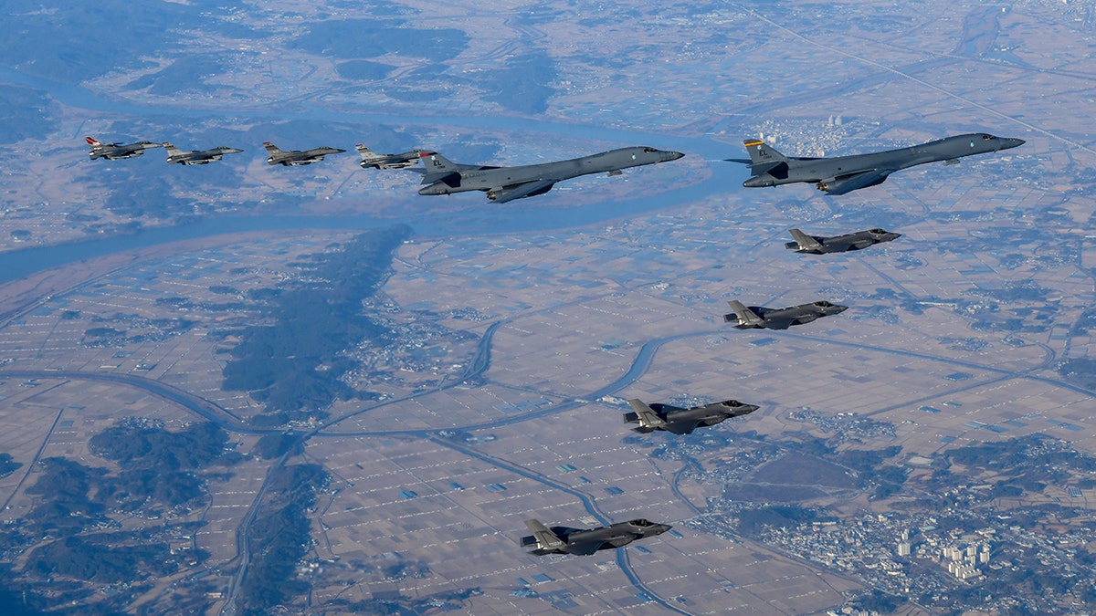 Several bombers flying in a "V" formation