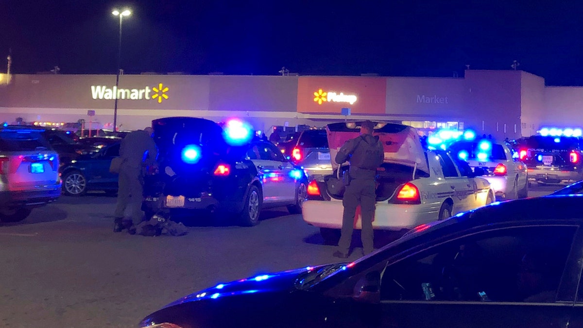 Emergency vehicles in the Walmart parking lot