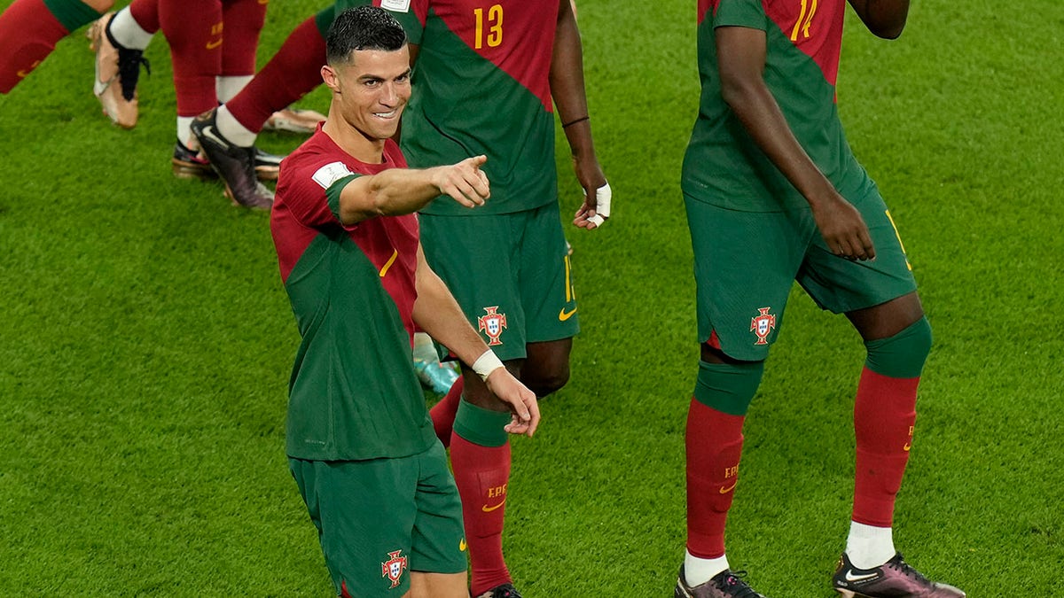 Portugal's Cristiano Ronaldo celebrates after scoring during the World Cup Group H soccer match between Portugal and Ghana, at the Stadium 974 in Doha, Qatar, Thursday, Nov. 24, 2022. 