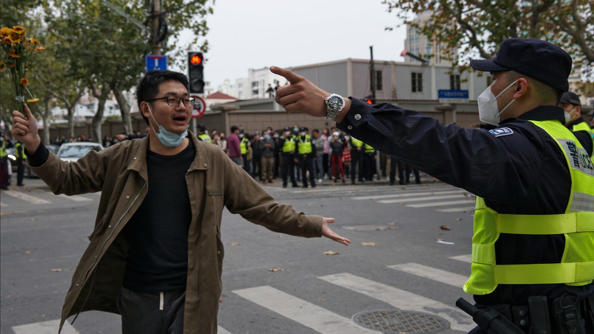 Protester holds flowers in China