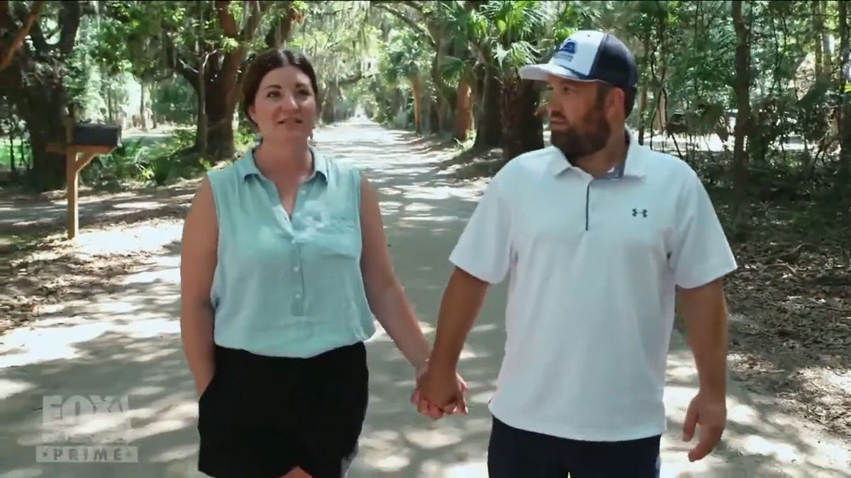 Amy and Dusting taking a walk through the trees.