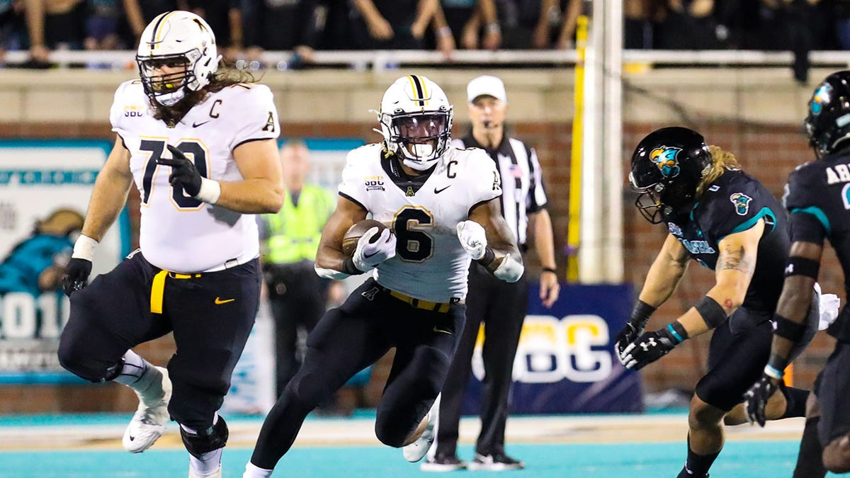 Appalachian State runs with the football