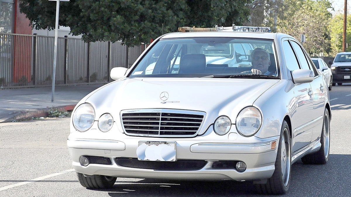 Jay Leno sits in driver's seat