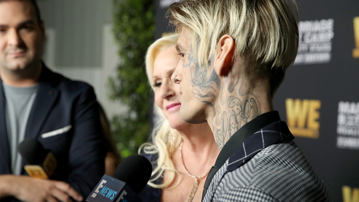 Aaron Carter with his mother Jane Carter during a red carpet interview
