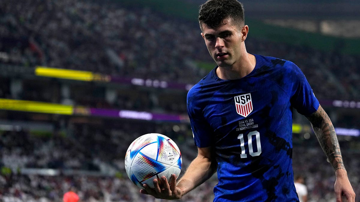 Christian Pulisic holds the ball