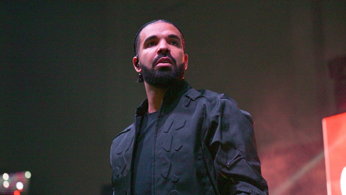 Drake performing at a concert