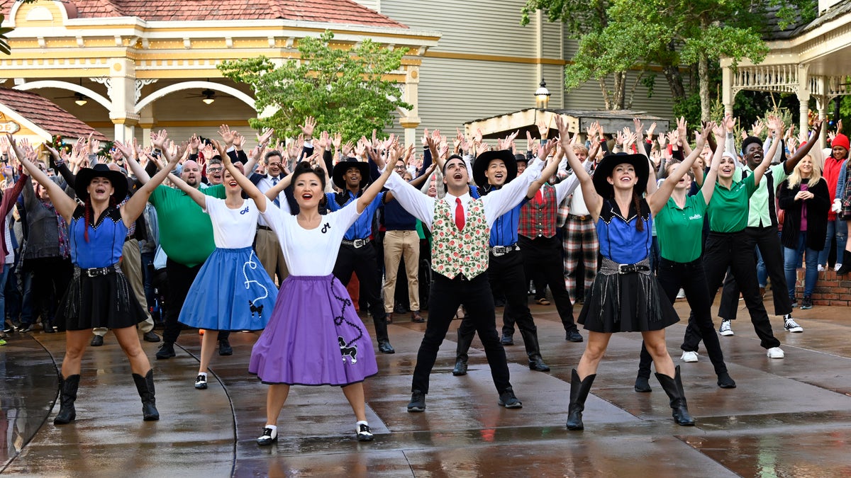 Dancers take the Dollywood streets for Dolly Parton Christmas movie