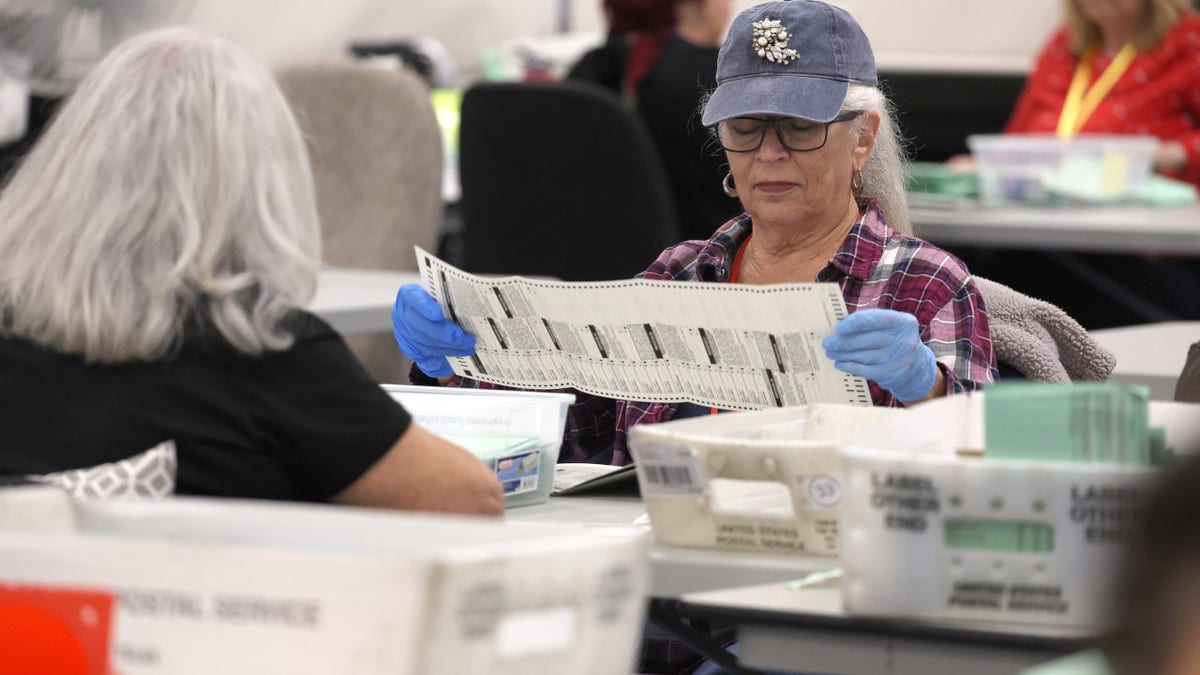 Arizona election workers counting ballots