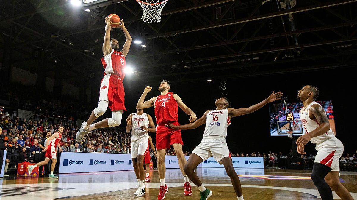 Player slam dunks in FIBA World Cup game