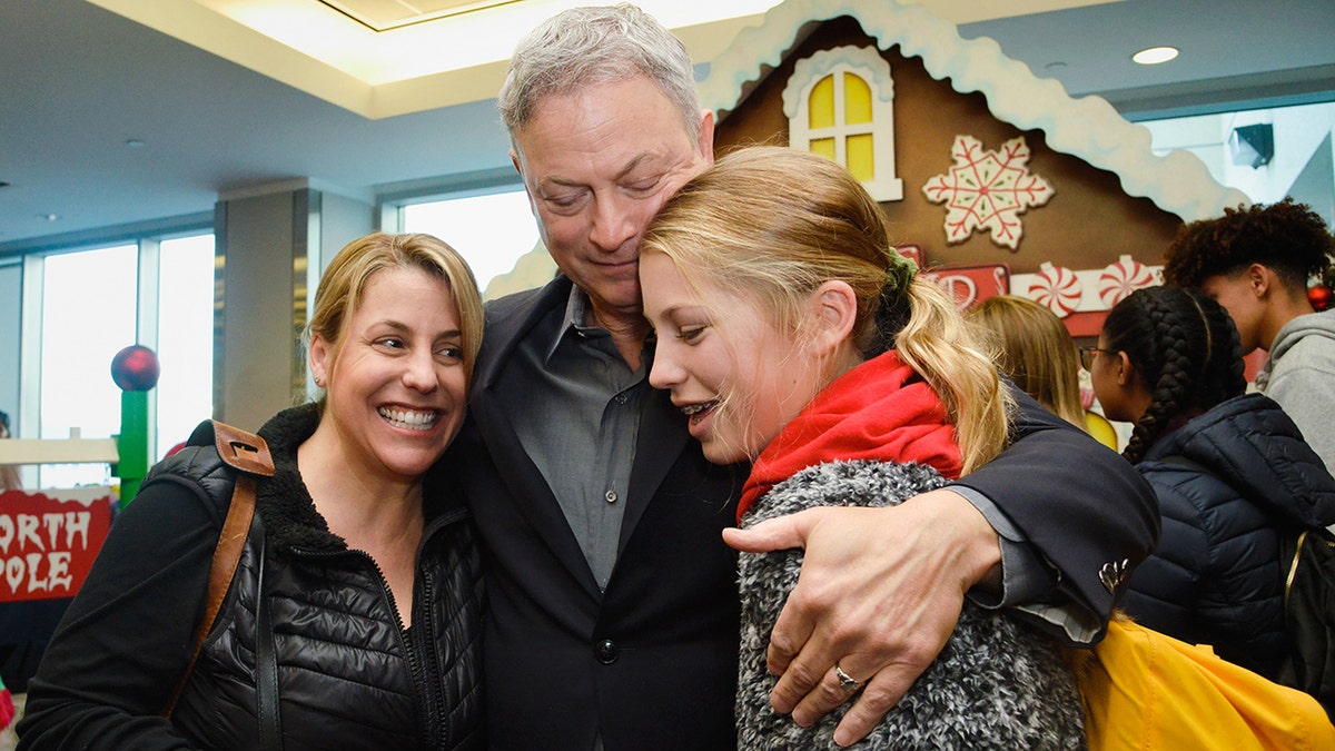 LOS ANGELES, CA - DECEMBER 08: Actor/humanitarian Gary Sinise meets with Gold Star families at the Gary Sinise Foundation's Snowball Express Send-Off Celebration at LAX Airport on December 8, 2018, in Los Angeles, California. 