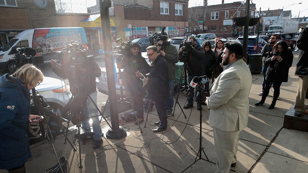 Media staging outside Ed Burke office after search warrant