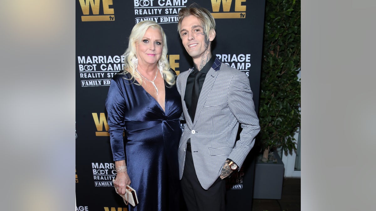 Aaron Carter with his mom Jane Carter at an event