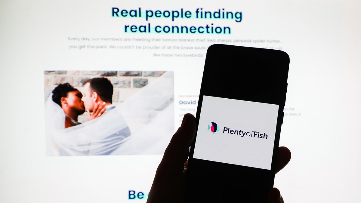 File photo of Plenty of Fish app logo is displayed on a mobile phone screen photographed on Plenty of Fish website background. Police in Wisconsin are warning women about being victimized by a man they are meeting on dating apps. 