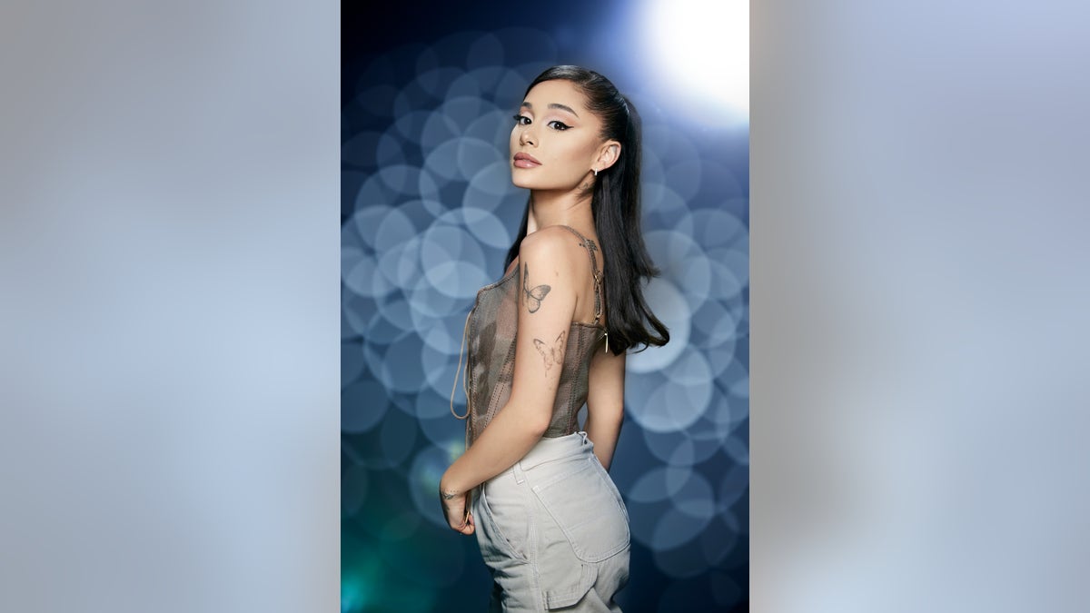 Ariana Grande in a promotional photo for "The Voice" season 21