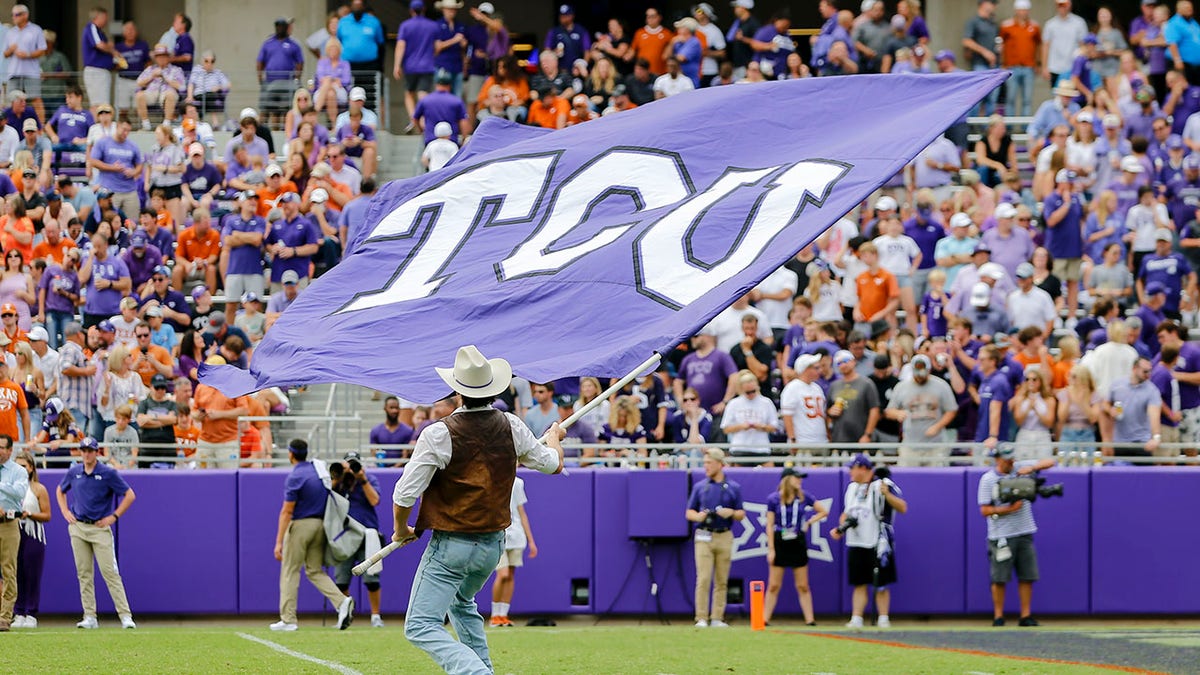 A TCU flag flies at a game in 2021