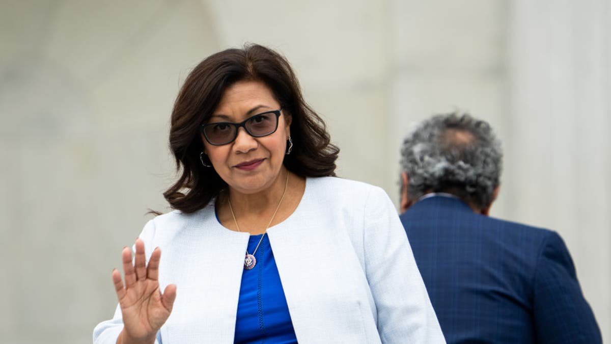 Rep. Norma Torres in white blazer