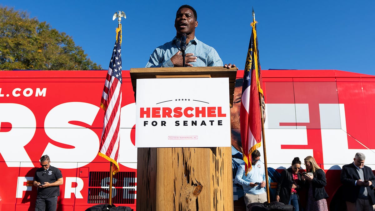 Herschel Walker speaks at a campaign rally