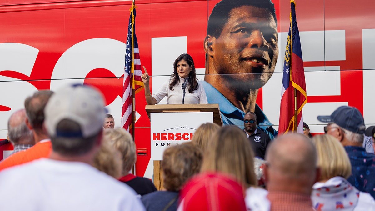 Nikki Haley in front of Walker bus