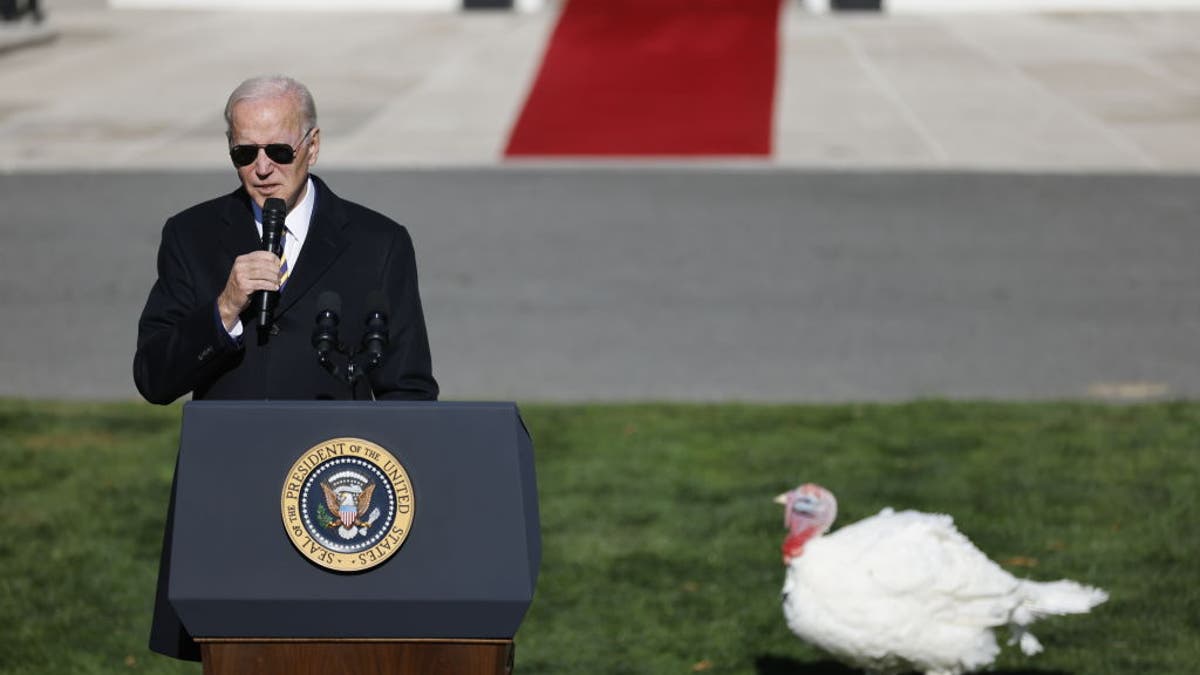 US President Joe Biden speaks after pardoning the National Thanksgiving Turkey during a ceremony on the South Lawn of the White House in Washington, DC, US, on Monday, Nov. 21, 2022. The National Thanksgiving Turkey and its alternate were raised near Monroe, North Carolina, and today's ceremony marks the 75th anniversary of the presentation. Photographer: Ting Shen/Bloomberg via Getty Images