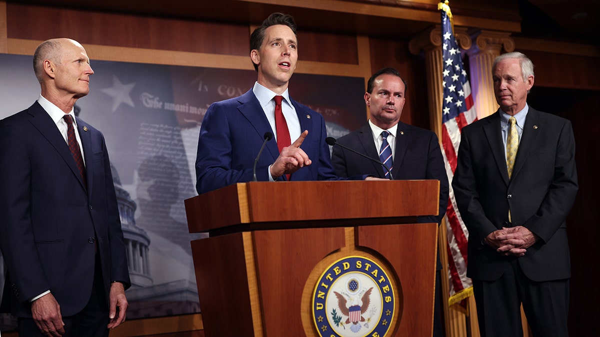 Josh Hawley speaking behind a podium