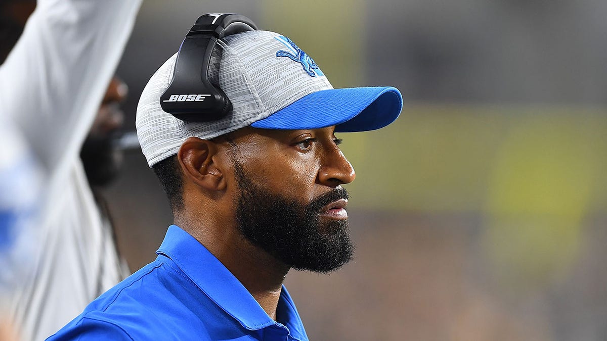 Aubrey Pleasant looks on from the Lions' sideline during a game vs the Steelers