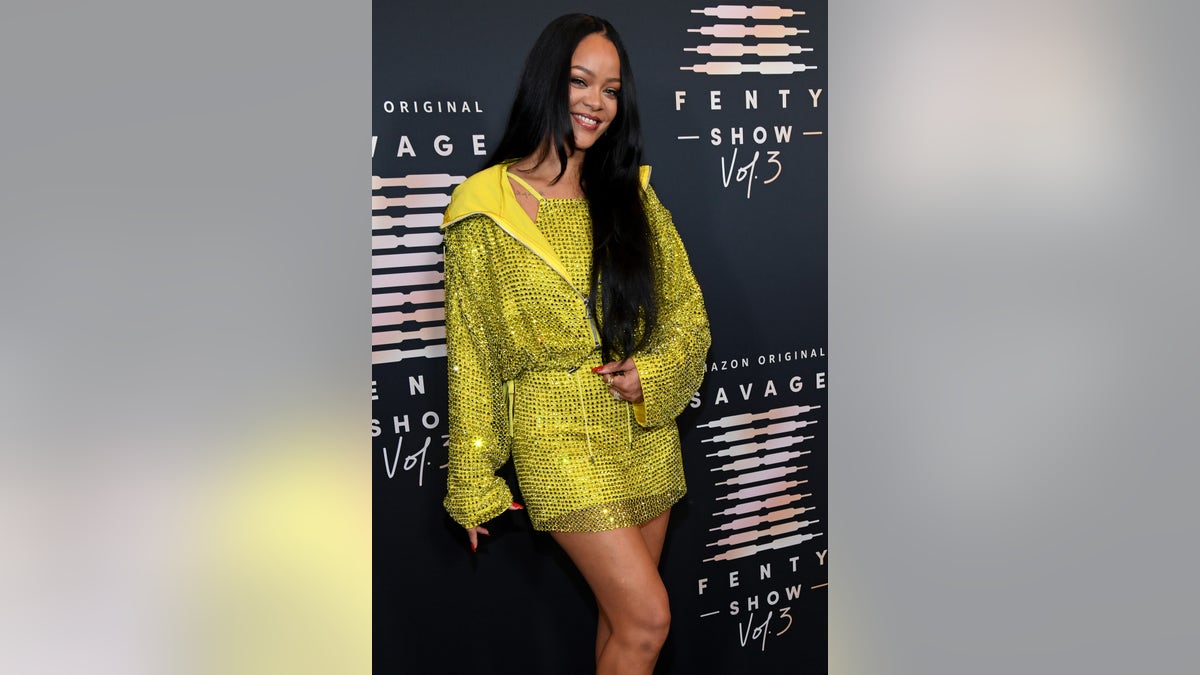 Rihanna in a yellow dress at the Save X Fenty Volume 3 show