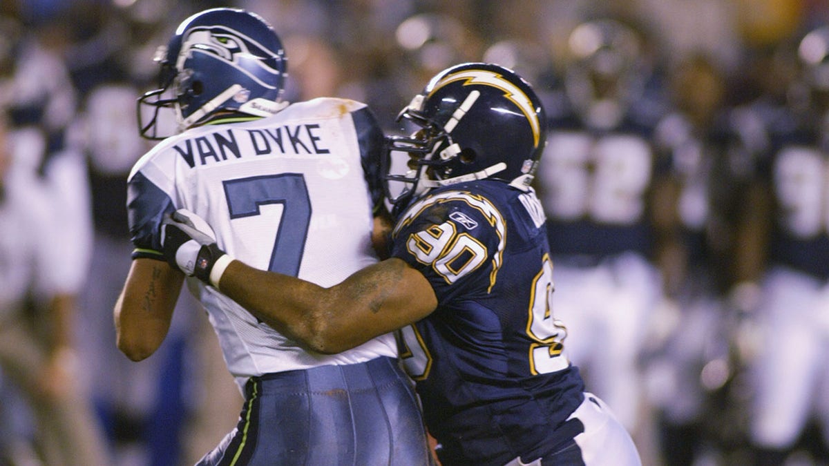 Adrian Dingle sacks quarterback Ryan Van Dyke