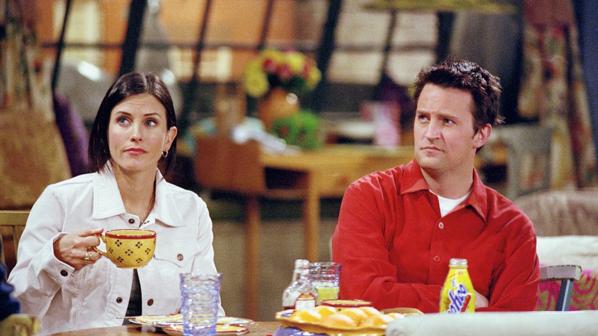 Courtney Cox and Matthew Perry as Chandler and Monica in the show "Friends"