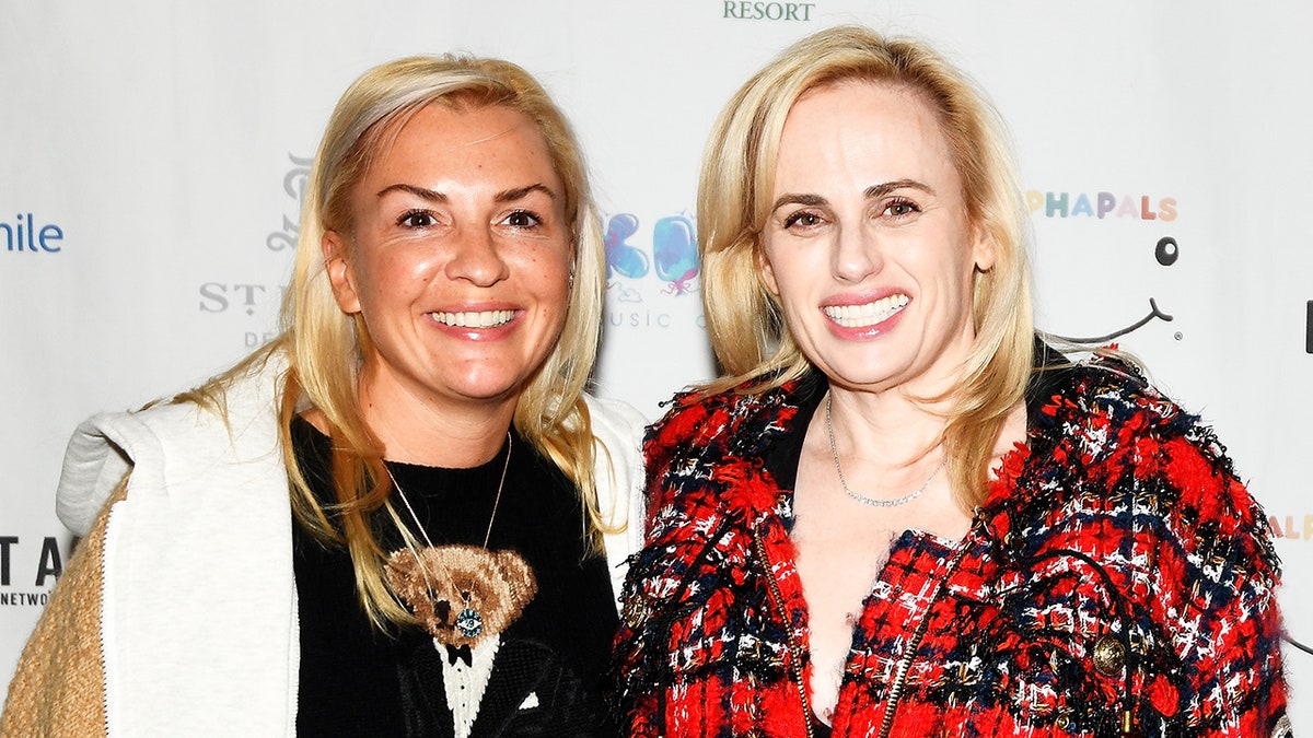 Rebel Wilson and her girlfriend Ramona Agruma smile for a picture at the Operation Smile's 10th Annual Park City Ski Challenge