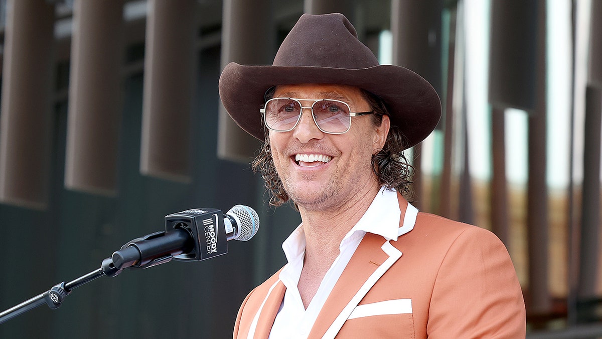 Matthew McConaughey speaks at the University of Texas, wears cowboy hat