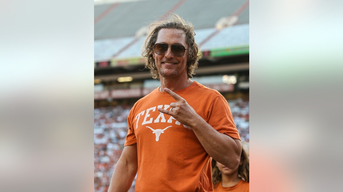 Matthew McConaughey in his orange Texas shirt