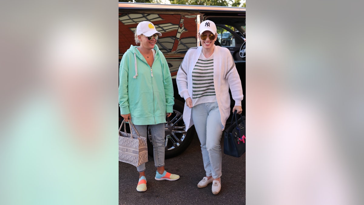 Rebel Wilson and her girlfriend Ramona Agruma both show up to the U.S. Open in jeans, baseball hats, and sunglasses