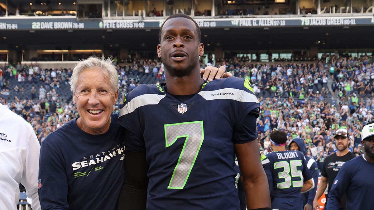 Pete Carroll and Geno Smith celebrate a Week 9 win