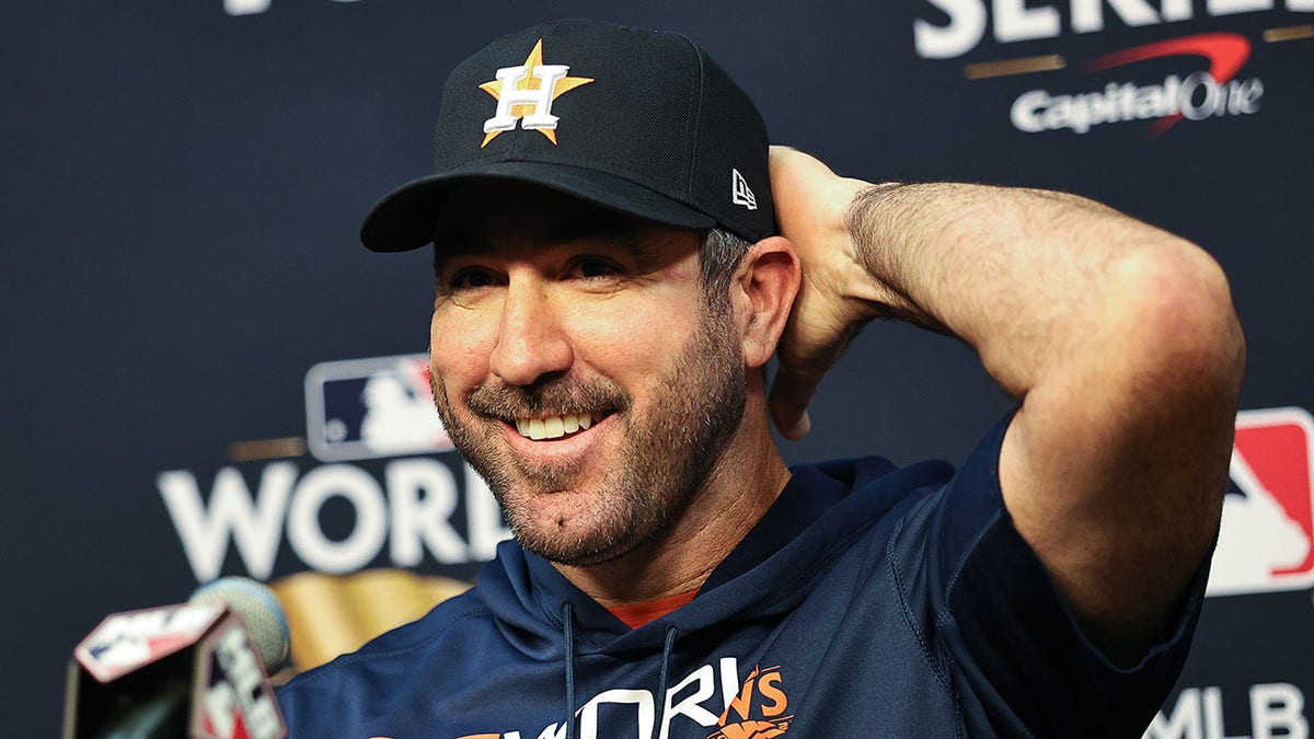 Justin Verlander smiles when talking to the media