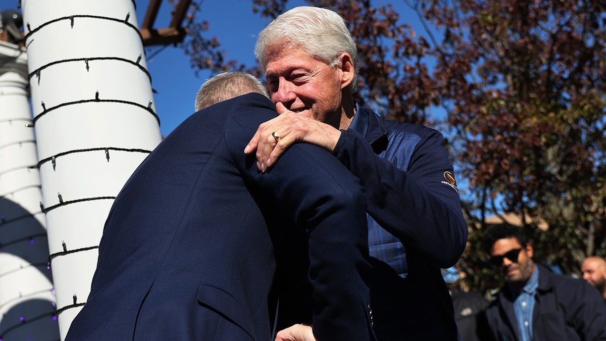 Bill Clinton hugs Maloney while campaigning in NY
