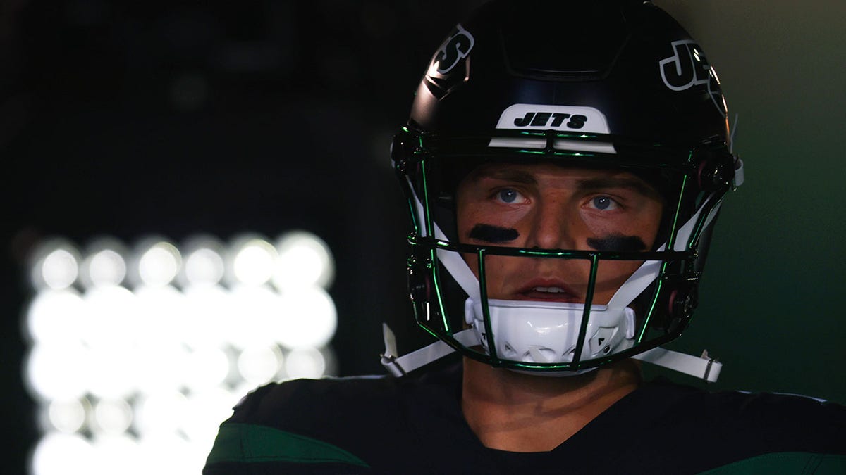 Zach Wilson standing in the tunnel before the Patriots game