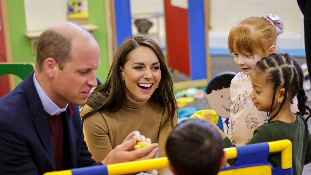 William and Kate playing with kids