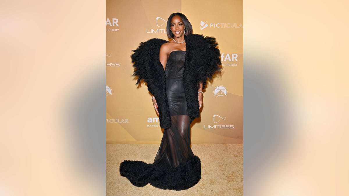 Kelly Rowland honored at amfAR Gala